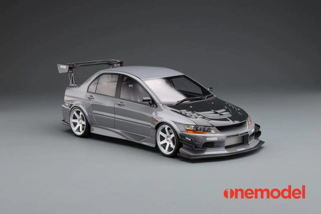 One Model 1:18 Mitsubishi Lancer Evolution IX Voltex with Carbon